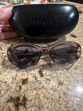 Gucci Women’s Smoke Transparent Oval Sunglasses